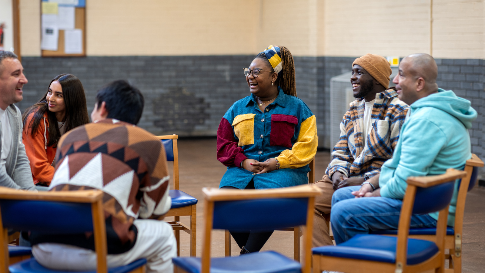 Group of people sitting in circle