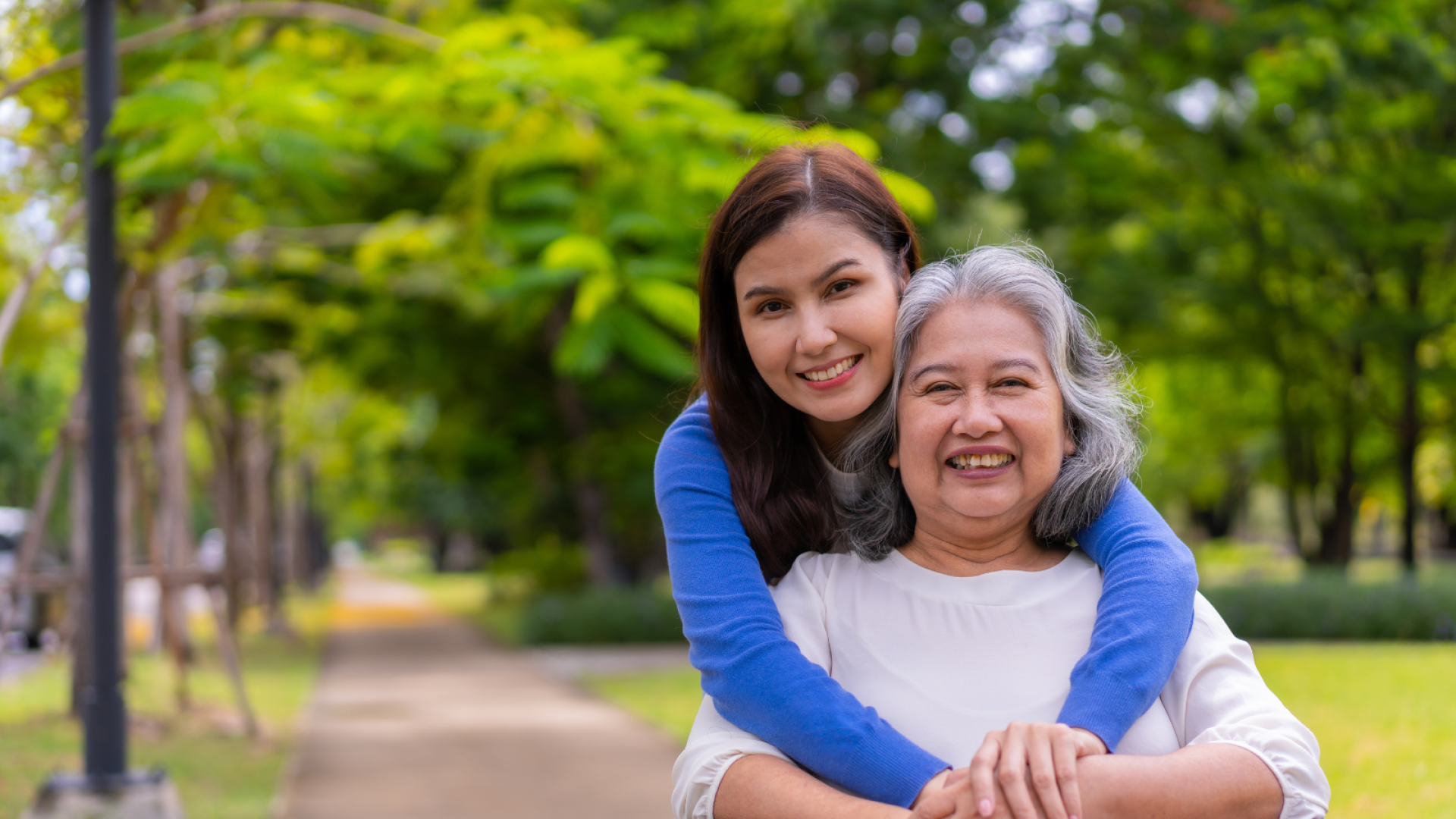 smiling younger and older female
